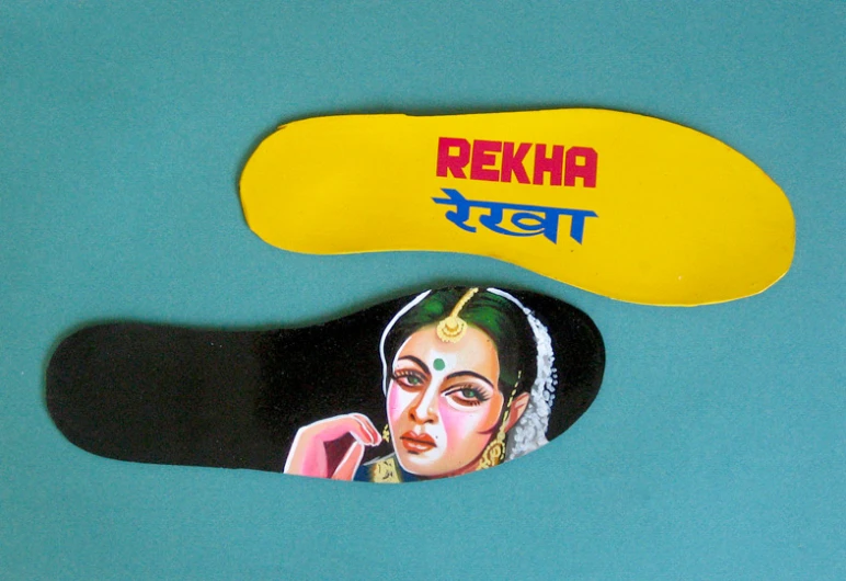 an image of a woman on a pair of sneakers with the words akka written in it