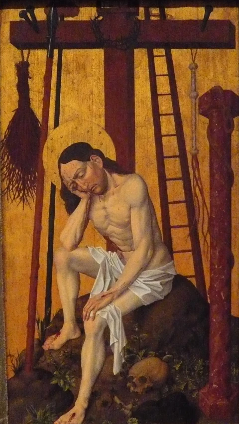 a painting on the wall depicts a man with an unfinished shirt on