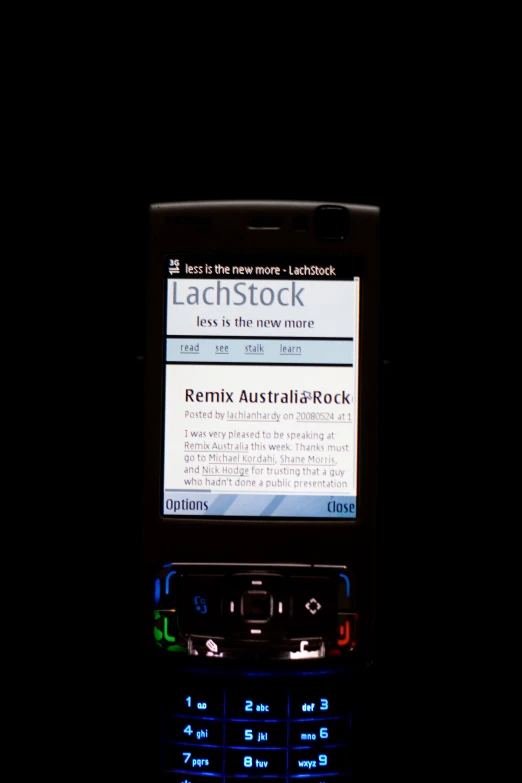 the image of a cell phone screen showing news on it