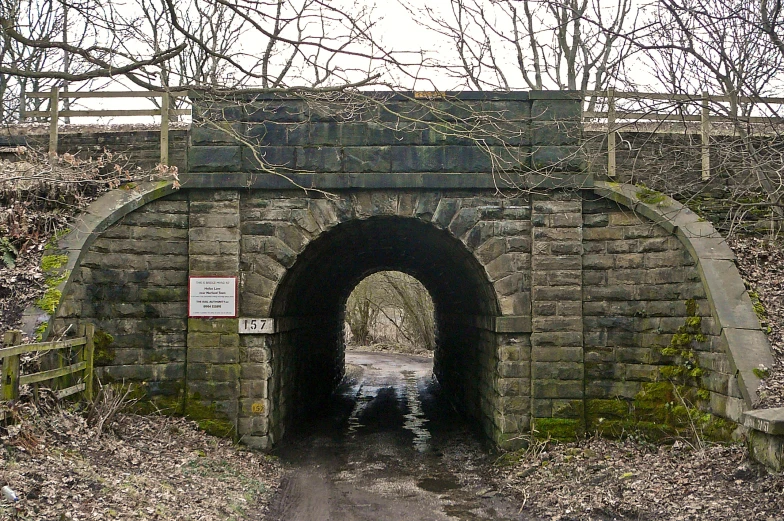 a road tunnel with a sign on it