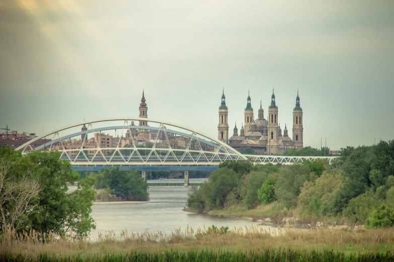 the city is visible with the bridge in the foreground