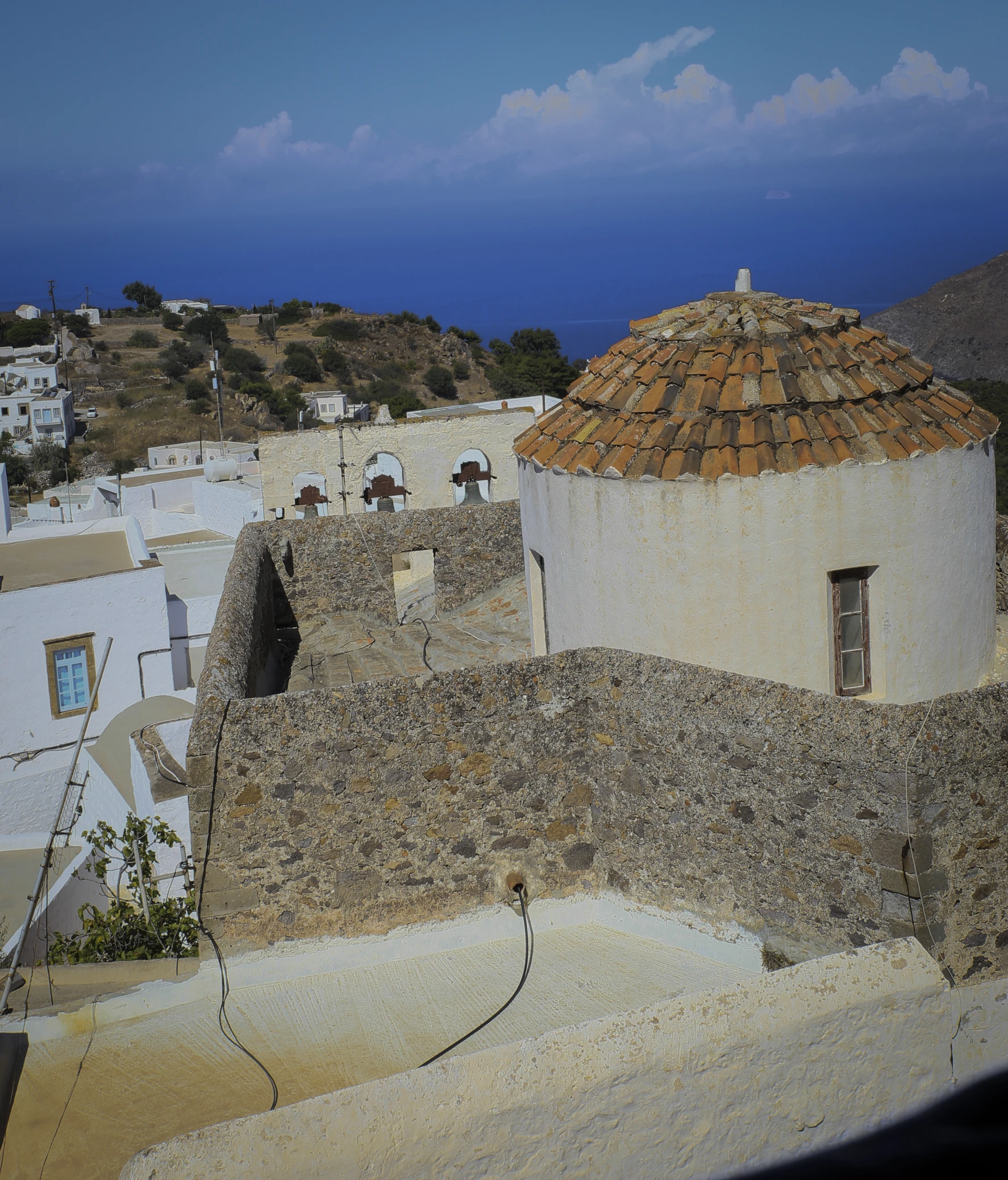 an old house that has a small round roof