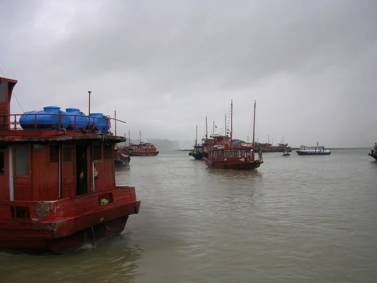 several boats floating in a body of water