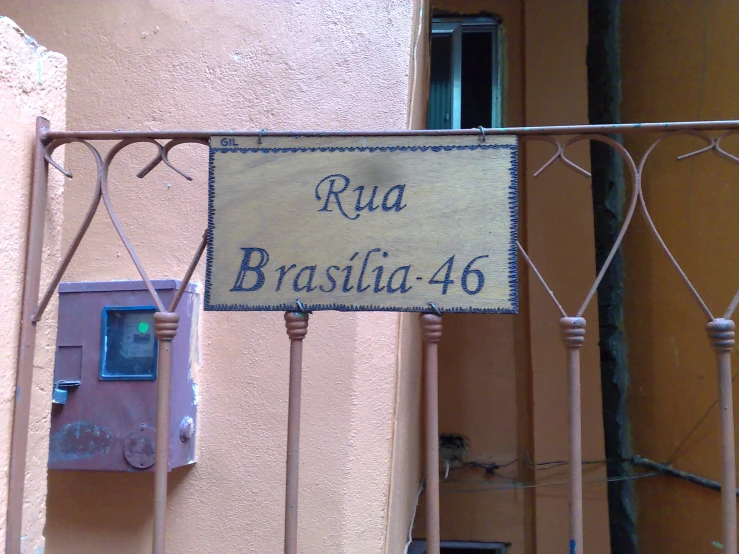 an outside view of a building with a sign