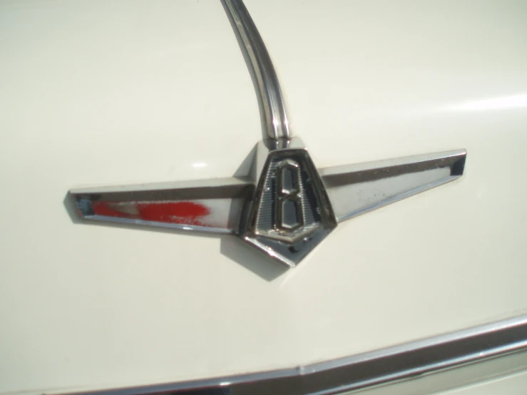 an image of a small car emblem