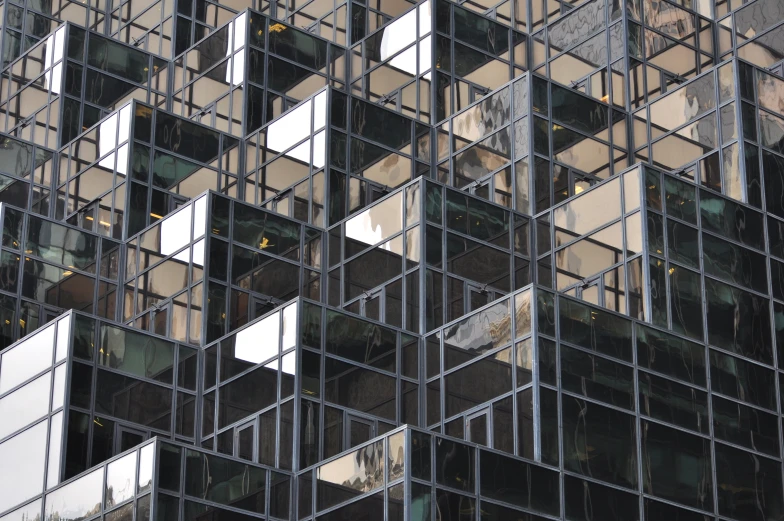 the building is made of glass and has multiple windows