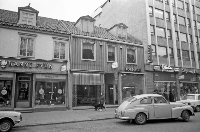 a black and white po of some old looking buildings