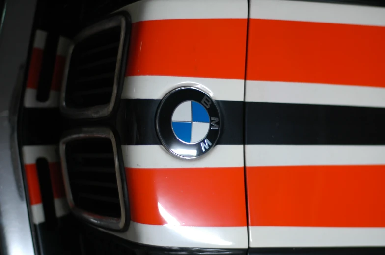 a close up view of the grille and hood on a sports car