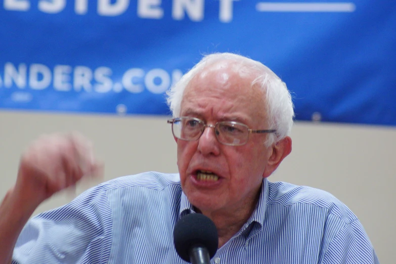 a close up of a person giving a speech