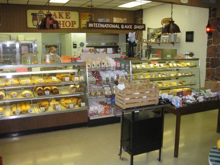 a bakery with cakes on display for sale