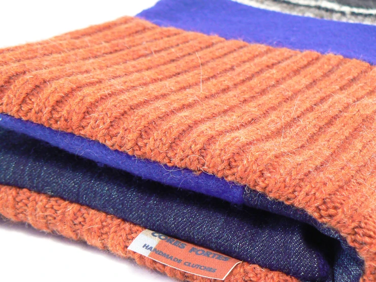 a orange and purple striped wool fabric