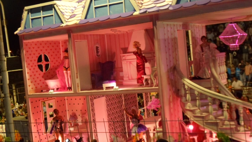 a house built into the street for barbie dolls