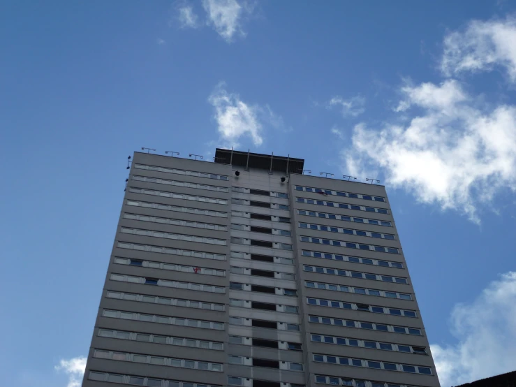 a building that has some clouds in it