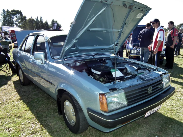 an old car that is under the hood