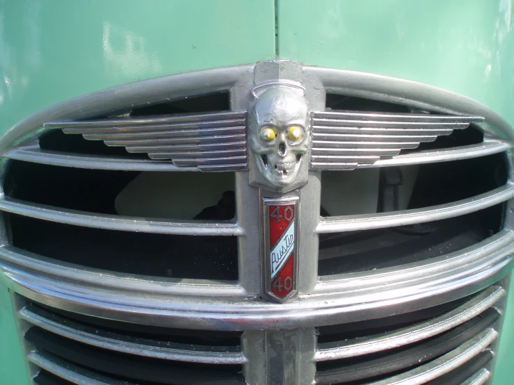 the grille on the front of a green car