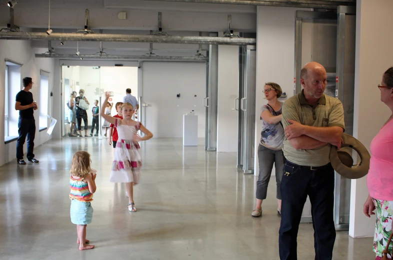 a group of people in a large room