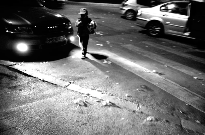 a black and white po of person on the street