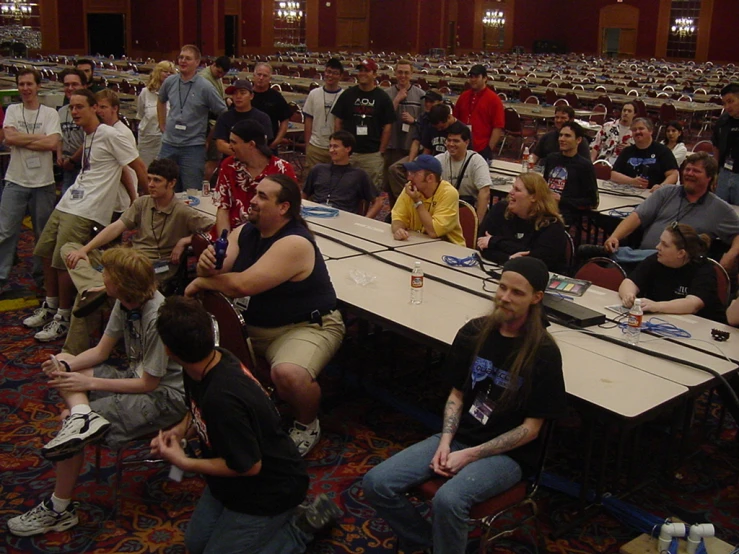 a bunch of people that are at a table