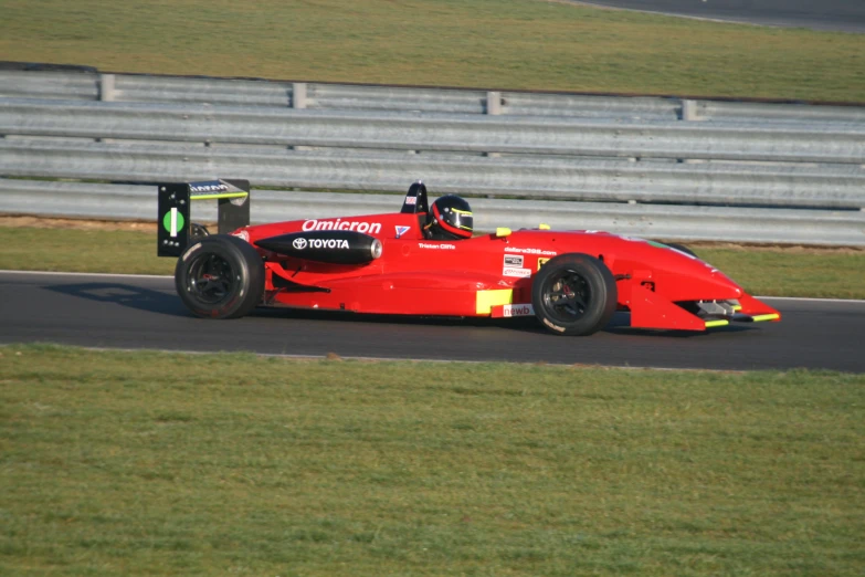 a racing car driving on a race track