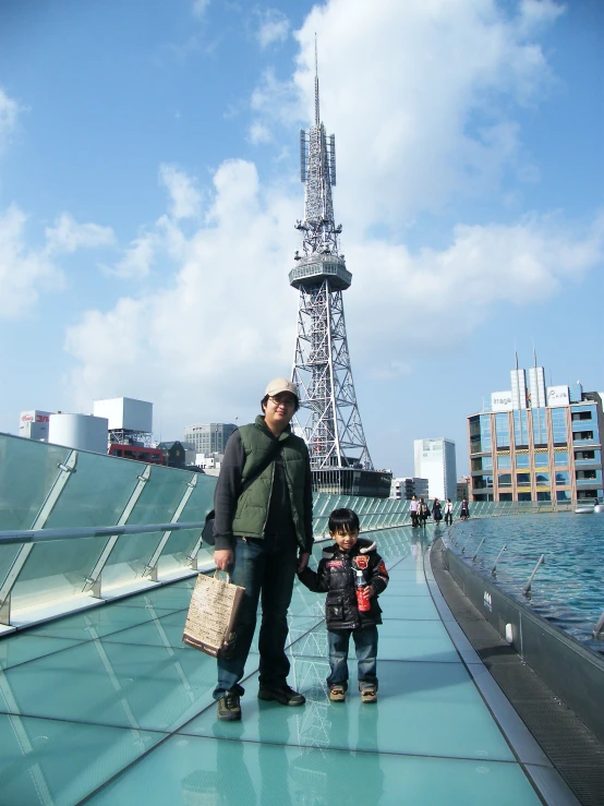 a man and boy on the roof of an airport terminal