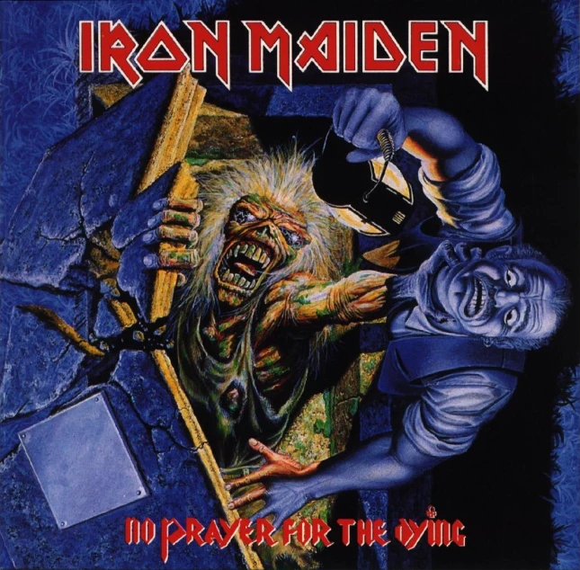 iron maiden is holding his head in the hand of another man