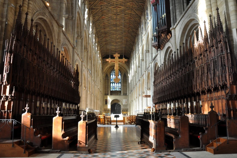 an old cathedral has many wood columns in the front