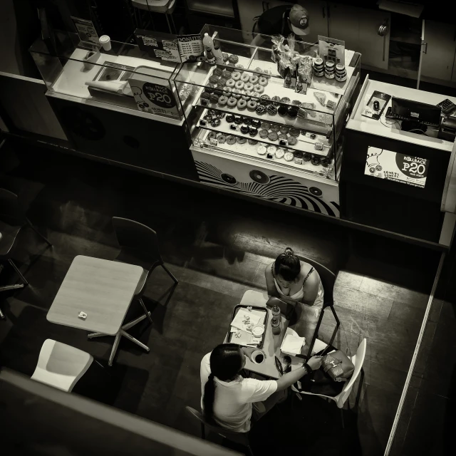 an aerial view of the breakfast room of a cafe