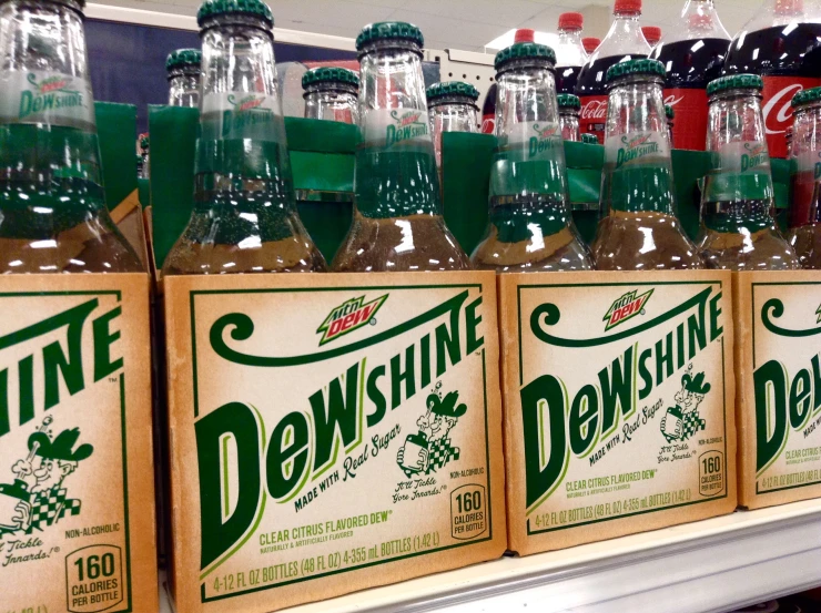 six bottles of dewshere are on display