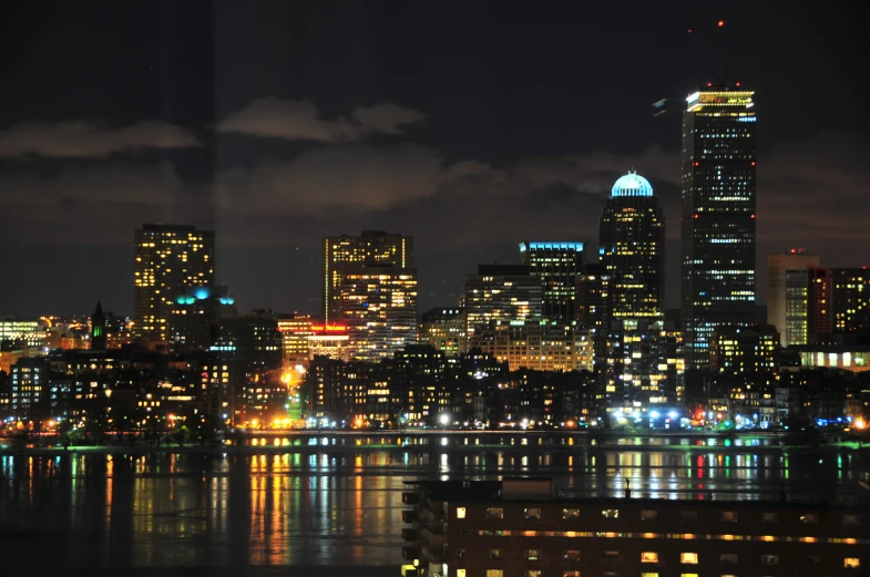 a large city in the distance lit up at night