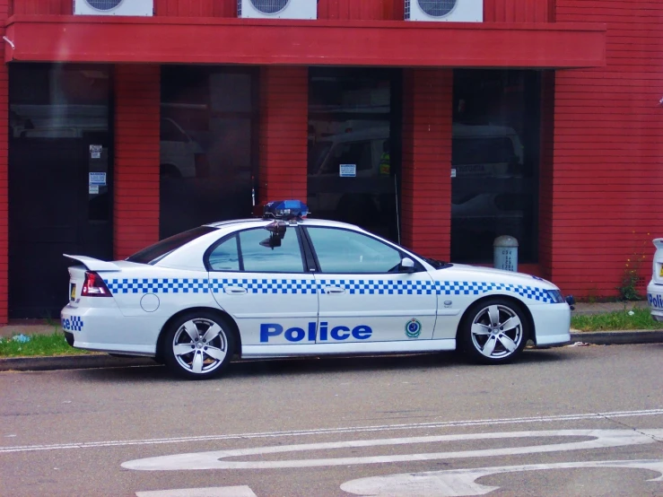 a police car that is sitting in the street