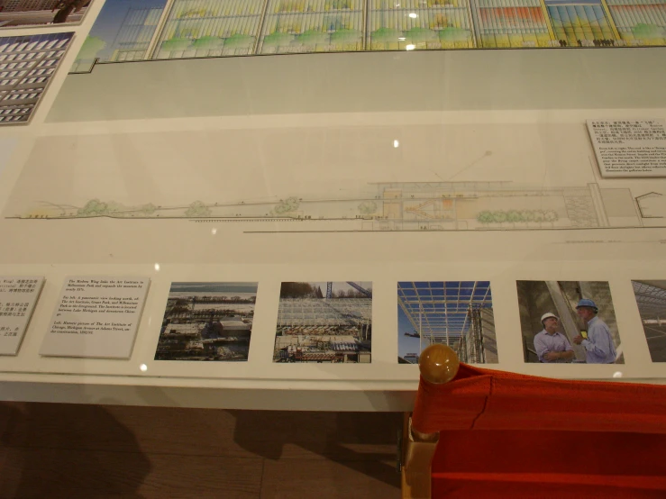 a number of pictures of buildings on display