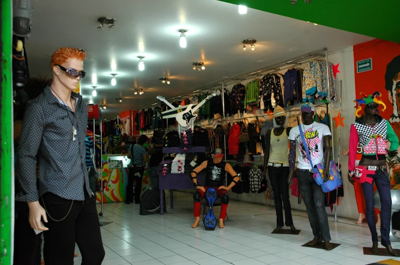 a man wearing sunglasses is standing outside a store