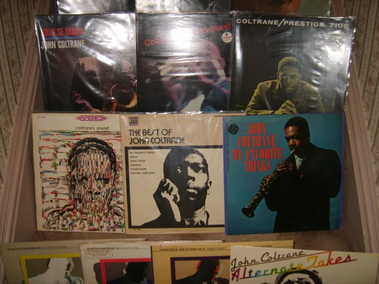 a collection of records from various eras in plastic wrap
