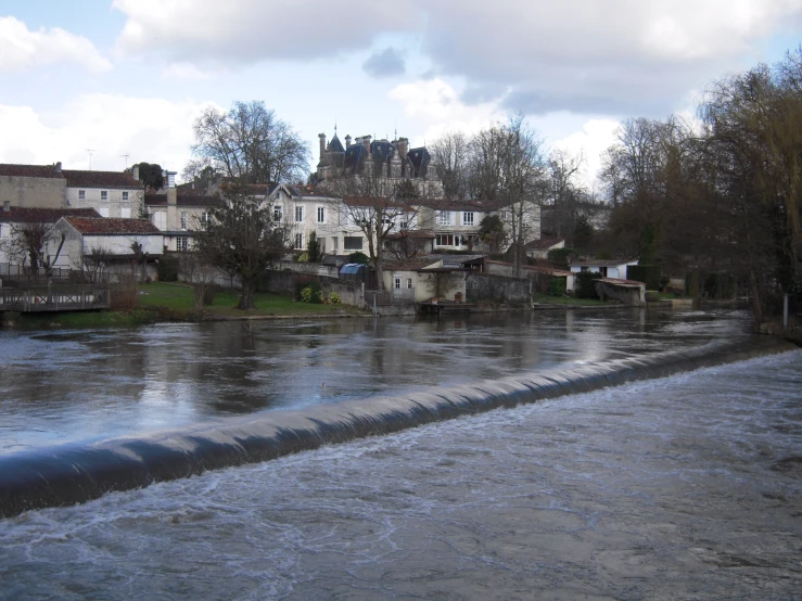 a large pipe is running out of the water