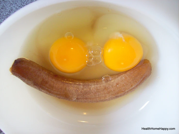 eggs in yogurt are placed in the shape of a banana