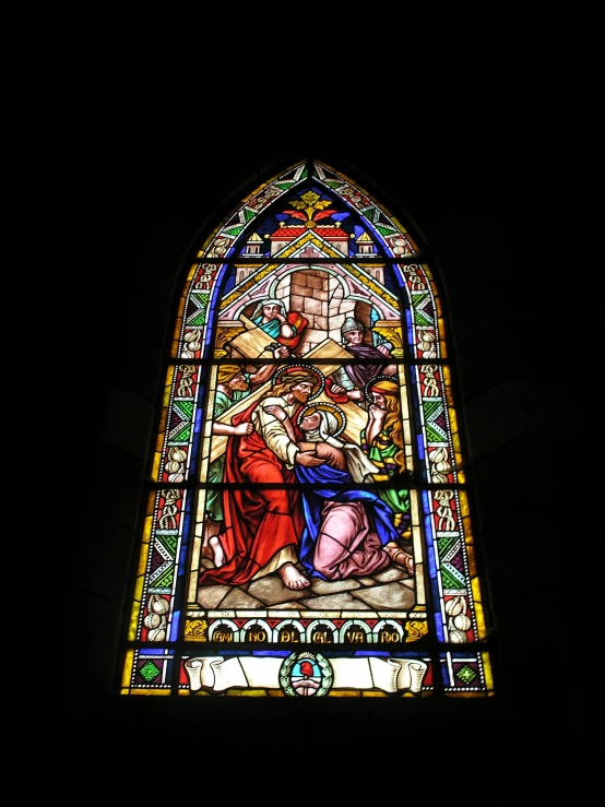 a picture of a stained glass window of jesus