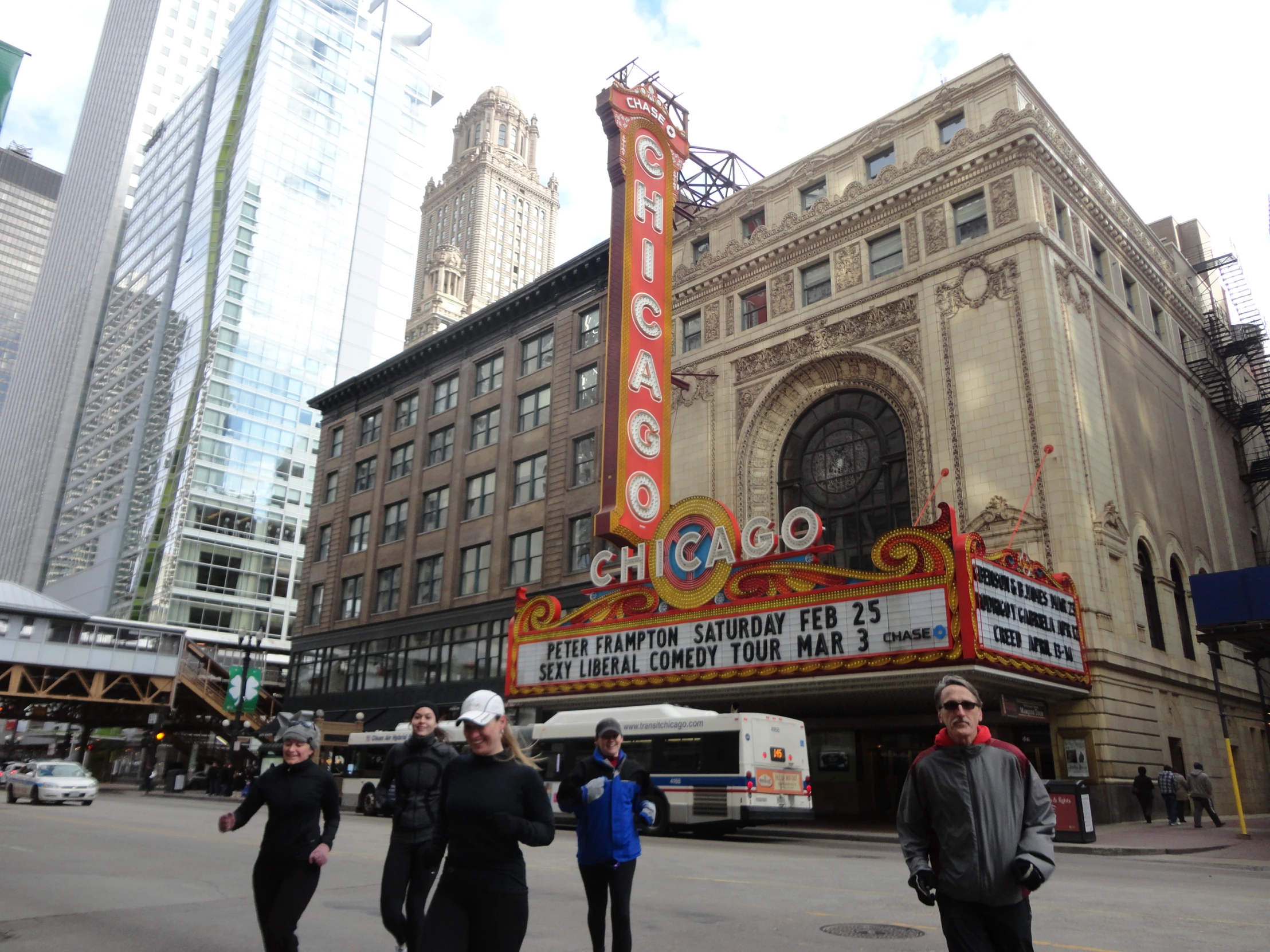 a big sign for the grand theatre that is in chinese characters