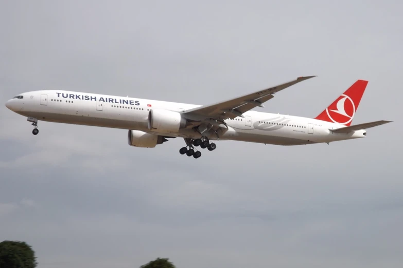 this large jumbo jet is flying very low