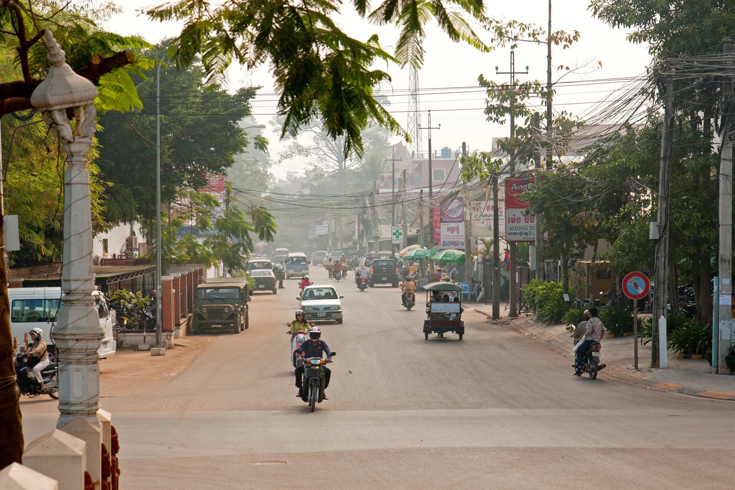 a motorcycle parked at the side of the street