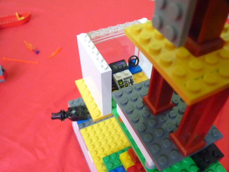this is a lego table with construction blocks and a person