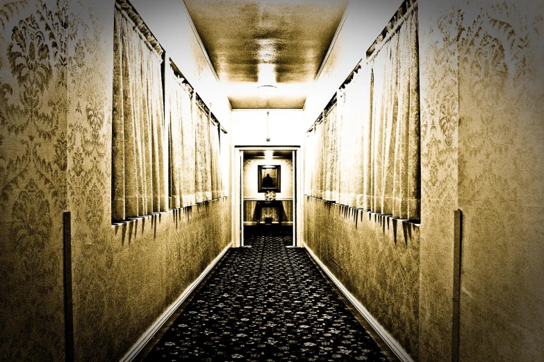 an empty hallway leading to a closed door