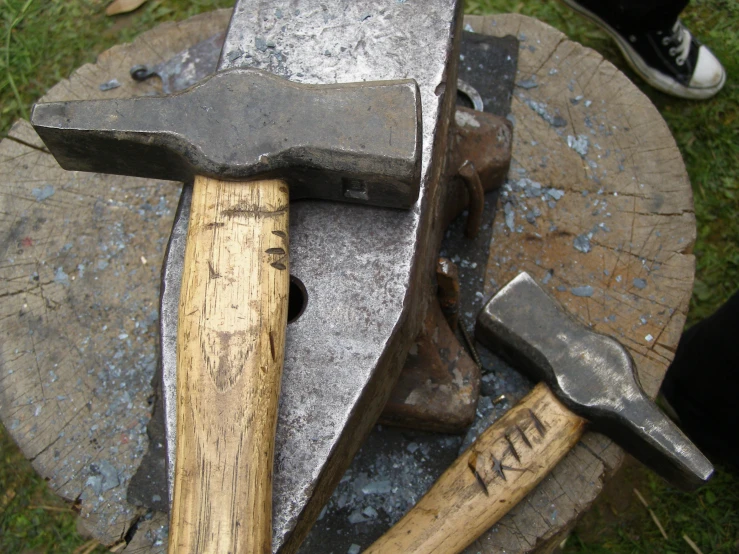 an assortment of different types of hammers, shaving, and chopping