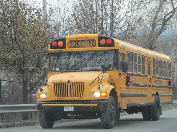 a school bus stopped in front of a building