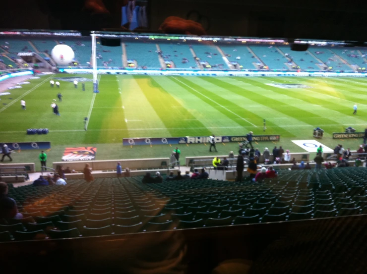 an image of a stadium where people are playing football