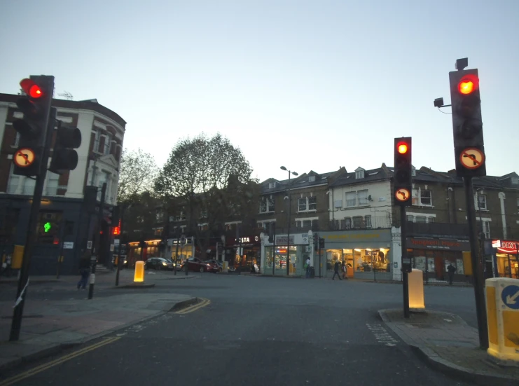 the intersection in a town with traffic lights