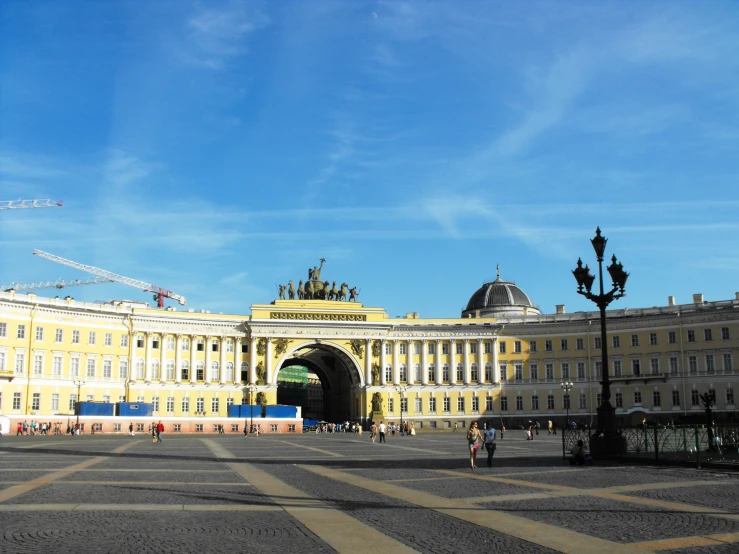 a large building with a lot of pillars and lights