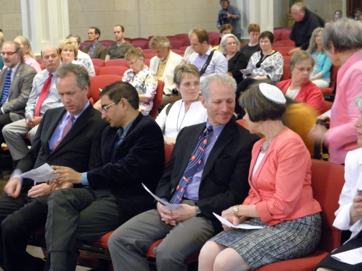 group of people in formal wear looking at the camera