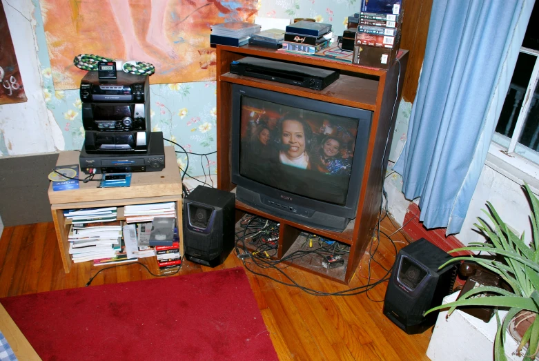 a television set that is next to a table