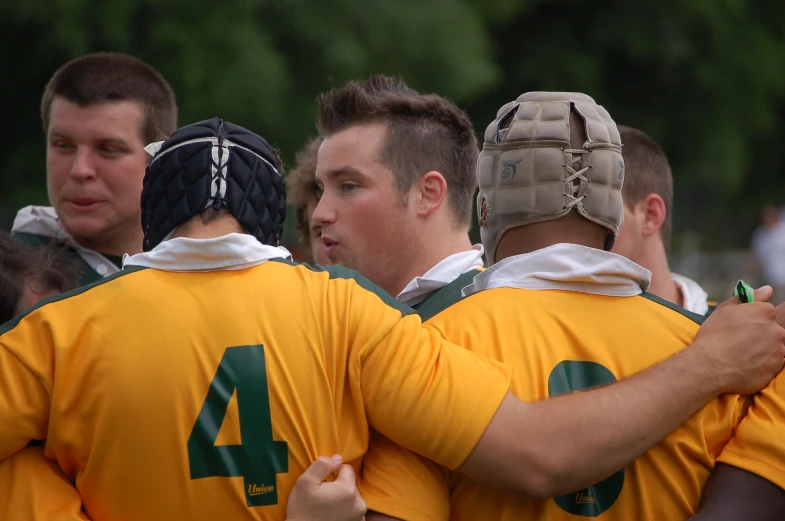 the team of the rugby league huddle around