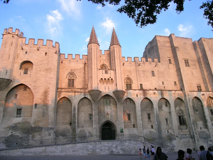 a large castle type building with multiple towers